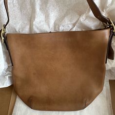 Euc Authentic Coach Brown Leather Bag With 2 Buckles On The Strap. Impeccable Interior, Some Minor Spots On The Outside. I Have Recently Received It From The Coach Store Where It Received A Cleaning. I Will Ship In The Same Box Coach Sent Me. Cognac Leather Coach, Classic Dark Tan Shoulder Bag With Adjustable Strap, Classic Brown Bucket Satchel, Classic Dark Tan Crossbody Shoulder Bag, Cognac Saddle Shoulder Bag For Everyday, Classic Coach Bucket Bag For Everyday Use, Classic Dark Tan Bags With Adjustable Strap, Classic Cognac Tote Hobo Bag, Classic Brown Crossbody Bucket Bag