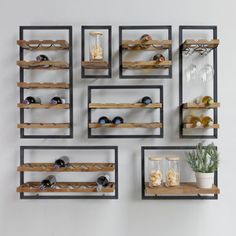 several wooden shelves with wine glasses on them