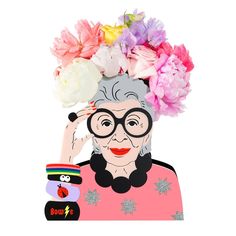 an old woman with glasses and flowers on her head is holding a small doll in front of her face