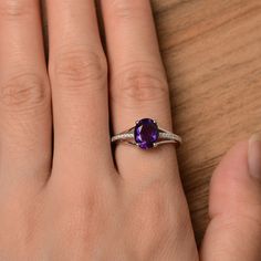 It is a natural amethyst ring. The main stone is 7mm*9mm oval cut, weight about 1.77 carats. The basic metal is sterling silver and plated with rhodium. To change the metal to a solid gold (white/rose) or platinum is also available, please ask for a quotation if you want. You can also go to my shop Home for more elegant rings: https://www.etsy.com/shop/godjewelry?ref=hdr_shop_menu More rings: https://www.etsy.com/shop/godjewelry?ref=l2-shop-header-avatar Customization is always welcome and pleas Oval Amethyst Ring With Cubic Zirconia For Promise, Oval Amethyst Cubic Zirconia Promise Ring, Oval Amethyst Promise Ring In White Gold, White Gold Amethyst Promise Ring With Oval Shape, White Gold Oval Amethyst Promise Ring, Oval Purple Amethyst Ring With Cubic Zirconia, Oval Amethyst Ring With Cubic Zirconia, Oval Amethyst Cubic Zirconia Ring, Oval White Gold Amethyst Promise Ring