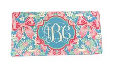 a blue and pink flowered monogrammed placemat with the letter b on it