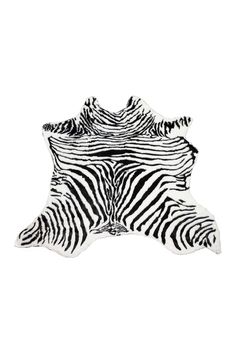 a zebra print rug with black and white stripes on the bottom, in front of a white background