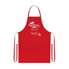 a red apron with the words santa's bad chef on it and a mustache