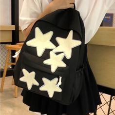 Stylish Black Backpack Featuring White Star Patches. Perfect For Daily Use. Herschel Backpack, Nylon Travel Bag, Adidas Backpack, Suede Backpack, Heart Plush, Brown Backpacks, Red Backpack, Floral Backpack, Backpack Travel Bag