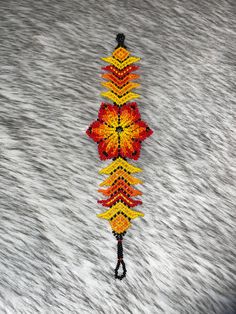 a colorful kite is being flown in the snow