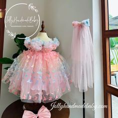 ♥ ENCHANTING ELEGANCE: BIRTHDAY BLISS WITH THE BUTTERFKY TULLE DRESS Are you looking to make your little girl's birthday celebration truly enchanting and memorable? Look no further than the exquisite Butterfly Tulle Dress from JollyHandmadeBaby! Our dress combines elegance and whimsy, creating a magical experience that your daughter will cherish forever. In this article, we will explore the enchanting features of the Butterfly Tulle Dress and how it can add bliss to your little one's birthday ce Pink Princess Dress For First Birthday In Spring, Playful Pink Tulle Princess Dress, Pink Dress For First Birthday In Spring, Pink Sweet Princess Dress For Summer, Sweet Pink Princess Dress For Summer, Fitted Dress For First Birthday Easter, Pink Short Sleeve Tutu Dress For Spring, Blue Princess Dress For First Birthday In Spring, Pink Tulle Dress For Easter