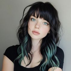 Wavy black hair with bangs, teal streaks Black Hair With Teal Streaks, Black Hair With Turquoise Underneath, Black Hair With Teal Tips, Brown Hair With Teal Tips, Teal Highlights In Black Hair, Teal And Black Hair, Black Turquoise Hair, Teal Bangs Brown Hair, Black And Turquoise Hair