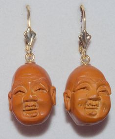 Absolutely spectacular antique arhat Buddha carved from olive pit prayer beads Measuring approximately 19 inches in length, the circumference around Each individually carved Buddha is differently carved with very intricate face A fabulous find from an estate sale in St. Louis, MO These prayer beads are a very unique and rare find I made these earrings from matched Buddha faces with 14k lever backs Unique, high polish, beautiful You will love weraing them. Antique Brown Carved Jewelry, Traditional Gold Carved Earrings, Traditional Brown Carved Jewelry, Coral Roses, Buddha Face, Coral Ring, Leverback Earrings, St Louis Mo, Prayer Beads