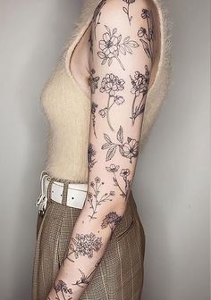 a woman with a tattoo on her arm