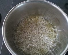 boiling water in a pot on the stove