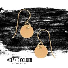 These sleek and modern Tiny Disc Dangle Earrings are the perfect accessory for any outfit. Made with 14k goldfill, they are both beautiful and durable. The smooth discs catch the light beautifully, making them the perfect earrings for a night out or a special occasion. Whether you're dressing up or dressing down, these earrings will add a touch of elegance to your look. Gold Minimalist Sterling Silver Earrings, Minimalist Gold-toned Sterling Silver Earrings, Minimalist Gold Sterling Silver Earrings, Adjustable Modern Earrings In 14k Gold Filled, Modern Adjustable 14k Gold Filled Earrings, Modern 14k Gold Filled Linear Earrings Gift, Modern 14k Gold Nickel-free Earrings, Adjustable Minimalist Yellow Gold Earrings, Modern Nickel-free 14k Gold Earrings