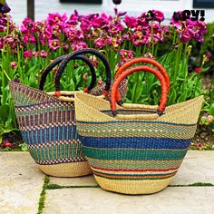 The U-shopper basket is the perfect tote, beach bag, shopper, everyday bag, or home decor basket. The beautiful bolga baskets are hand-woven in small villages of Ghana, a tradition passed down from generation to generation. They are woven out of renewable resources, including banana leaf and elephant grass, which grow abundantly in the region. Each basket is hand woven and 100% unique! The leather handle is treated using an all-natural process (either dyed and oiled or painted). Note that handle Cheap Multicolor Beach Bag With Braided Handles, Multicolor Basket Crochet Bag For Market, Multicolor Crochet Basket Bag For Market, Multicolor Crochet Market Basket Bag, Multicolor Fair Trade Basket Straw Bag, Multicolor Basket Beach Bag For Market, Fair Trade Basket Beach Bag For Market, Multicolor Bucket Straw Bag For Market, Multicolor Basket Straw Bag With Handles