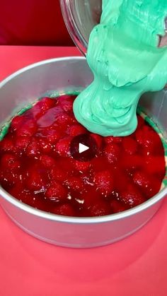 340K views · 1.5K comments | Easy 4 Layer Holiday Dessert! 😍 | Easy 4 Layer Holiday Dessert! 😍

#cheesecake #Christmas #desserts | By Kyle & Mistie Knight | And there you go. Our cookie
crust is done. We've let it cool and now, we're going to
add our first layer which is going to be strawberry pie
filling. You can just take the whole can and we're going to
spread that out using our spatula. Don't that look yummy.
I know our dog Zero thinks it does. That looks perfect. Now,
we're going to scoop that there and next, we're going to be
using some of this no-baked cheesecake. That stuff is my
favorite. And we're going to be adding some green food coloring
right on top of that and now we're just going to fold that
in so that we get a beautiful green colored cheesecake mix.
Now, as I said, this Colored Cheesecake, Buckeye Bars Recipe, Cheesecake Christmas, Cherry Fluff, Patty Cakes, Cool Whip Desserts, Dessert Cheesecake, Cheesecake Mix, Patty Cake