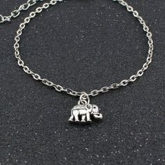 New Elephant Ankle Bracelet ~Choose from Stainless steel anklet chain or Silver plated anklet chain ~Anklet measures available in 9 inch, 10 inch, or 11 inch length plus has a 1 inch extender ~Elephant charm measures 1/2 inch wide ☆ Ships within 24 hours of purchase Monday-Saturday Adjustable Alloy Anklets For Gift, Adjustable Alloy Anklet As Gift, Adjustable Metal Anklets Nickel Free, Silver Alloy Anklet As Gift, Adjustable Metal Nickel-free Anklets, Adjustable Metal Dangle Anklets, Adjustable Alloy Summer Anklets, Summer Adjustable Alloy Anklets, Bohemian Metal Anklets With Adjustable Chain