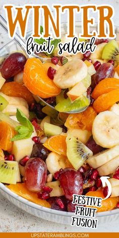 a bowl filled with fruit salad on top of a table