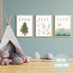 three children's posters with animals and trees on the wall in a child's room