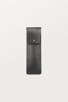 Classic and timeless BLACK PEN CASE with gold brass closure, made of high-quality sustainable (vegetable-tanned) genuine natural leather. This pen holder makes the perfect business gift for your colleagues, clients, or anyone else who appreciates quality and style. ✚ DIMENSIONS:  6 x 50,8 inch (6 x 19 cm) ✚ WHAT YOU CAN FIT IN IT: pens, pencils, crayons or markers. It will hold approx. 3-4 pens. ✚ PRODUCTION: the product is handmade entirely in Poland in our small leather craft workshop ✚ LEATHER: sustainable natural genuine vegetable- tanned leather, that has been tanned using extracts from the mimosa and quebracho trees. It comes from a Polish tannery and is stiff in texture. ✚ COLOR: black ✚ INTERIOR FINISH: suede, unlined ✚ CLOSURE: brass button studs (gold) ✚ PACKAGING: 100% eco-frien Eco Friendly Labels, Leather Pen Case, Craft Workshop, Pencil Case Pouch, Button Studs, Leather Pencil Case, Mommy Bag, Laptop Shoulder Bag, Diaper Bag Tote