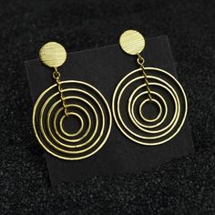 Earring Length : 56 mm Weight          : 4 gm ( Approx.) Material        : Copper Polish            : All Polish are Available Matte Finish Brass Layered Circle Earrings \ Push Back Dangle Earrings \ Western Circular Drop Earrings \ Wedding Earrings \ Gift For Sister . Contact us for wholesale prices. Wedding Circle Earrings In Metal, Round Metal Danglers For Pierced Ears, Drop Earrings Wedding, Earrings Western, How To Polish Copper, Wedding Earrings Drop, Electroformed Jewelry, Gift For Sister, Earrings Wedding