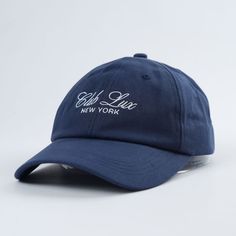 A chic navy and white baseball cap for topping off your lux outfits. Free gift option for Lux Loyalty members. Classic Navy Baseball Cap With Curved Visor, Navy Fitted Hat With Curved Brim For Streetwear, Navy Curved Brim Fitted Hat For Streetwear, Classic Navy Hat With Curved Visor, Classic Navy Baseball Cap With Curved Brim, Classic Blue Dad Hat With Curved Visor, Navy Cap For Streetwear, Classic Navy Snapback Baseball Cap, Classic Navy Snapback Hat With Curved Brim