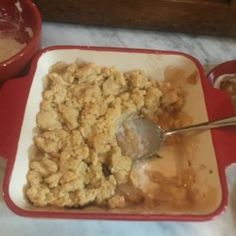 a bowl of cereal with a spoon in it