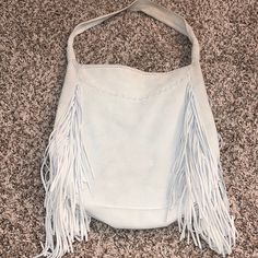 Super Heavy, Gorgeous Suede/Leather. I Only Remember Carrying This A Few Times But The Rim At The Top Of The Bag And The Strap Could Use A Cleaning. The Rest Of The Bag Is Pristine And Looks Brand New. A Gorgeous Light Gray. One Zip And Two Inside Slip Pockets. Very Boho. 15 Inches Long By About 13 Across. Leather Fringe Hobo Bag For Shopping, Leather Shopping Bag With Fringe, Leather Fringe Shoulder Bag For Shopping, White Fringe Shoulder Bag For Everyday Use, Daily White Shoulder Bag With Fringe, Hobo Bag, Light Gray, Suede Leather, Genuine Leather