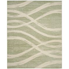 an area rug with wavy lines on the side and light green, white, and beige colors