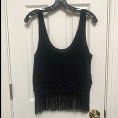 This Is A Forever 21 Brand Sleeveless Tank Blouse / Top In A Women’s Size Small. Top Is Solid Black And Has Solid Black Fringe Sewn Along The Bottom Hem. Top Is Brand New With Tag Still Attached. Would Be Such A Great Addition To Your Spring And Summer Wardrobe! Top Measurements: Armpit To Armpit Flat Measurement Across The Front: 19” Top Of Shoulder To Bottom Of Fringe Hem: 25” (Fringe Has A 5” Drop) Willing To Consider Reasonable Offers Chic Fringe Tank Top For Summer, Sleeveless Fringe Crop Top For Night Out, Summer Vest Crop Top For Night Out, Vest Crop Top For Night Out In Summer, Summer Fringe Crop Top For Night Out, Summer Crop Top Camisole For Night Out, Spring Party Tank Top With Fringe, Sleeveless Fringe Tops For Night Out, Summer Going Out Crop Tops