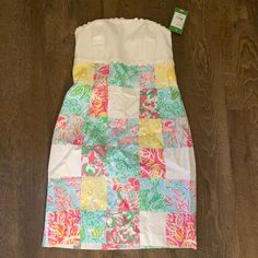 Lilly Pulitzer Franco Dress Color: State Patch Size: 2 Brand New With Tags; Never Worn White Patchwork Mini Dress, White Sleeveless Mini Dress With Patchwork, White Sleeveless Patchwork Mini Dress, White Patchwork Dresses For Spring, White Patchwork Dress For Spring, Summer White Patchwork Dress, White Patchwork Summer Dress, White Patchwork Mini Dress For Spring, White Patchwork Mini Dress For Beach