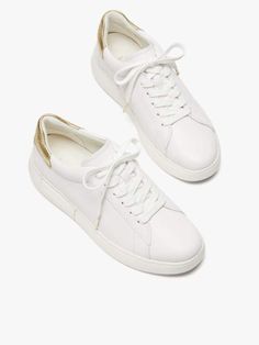 we call these our lift sneakers for a reason: the platform midsoles will add a little bit of height plus the supple nappa leather with pops of print and color will instantly elevate any outfit you pair them with. | Kate Spade Lift Sneakers, Optic White/Pale Gold - 11 Classic Flat Heel Sneakers With Removable Insole, Casual Lace-up Shoes With Textured Sole In Calf Leather, Chic Sneakers With Cushioned Footbed And Round Toe, Elegant Synthetic Sneakers With Textured Sole, Classic Low-top Lace-up Shoes With Removable Insole, Chic Leather Sneakers With Laces, Chic Lace-up Sneakers With Contrast Sole, Lace-up Calf Leather Sneakers, Chic Sneakers With Leather Sole And Round Toe