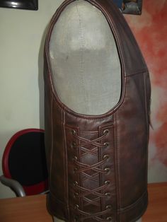 Genuine leather-1,6-1,7mm Genuine leather-brown HANDMADE MATERIAL: GENUINE LEATHER Three outer pockets. Two indoor pockets. Made by designer and leather tailor with experience of 30 years. There can be produced in any size and model take 5-10 days. Order can be any size from M to 6X. The leather can be selected by color, thickness up to 2 mm. How to remove size: chest width = cm or inch? waist width = cm or inch? length back = cm or inch? If any questions, please feel free to ask! Brown Biker Vest For Biker Events, Brown Biker Vest For Events, Fitted Leather Vest For Outdoor, Fitted Leather Vest With Rugged Style, Fitted Rugged Brown Vest, Fitted Leather Vest In Rugged Style, Brown Biker Vest, Brown Leather Biker Jacket For Motorcycling, Fitted Brown Rugged Vest