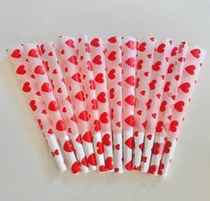 valentine's day paper straws with red hearts on them