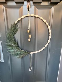 a wreath is hanging on the front door