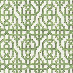 a green and white wallpaper with an intricate design