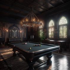 a billiard table in a dark room with chandelier and stained glass windows