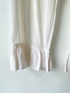 Dosa White Bloomers! These are meant to be pranced in. 100% cotton with ruffles along the hem and an elastic waistband. Hand spun in India. Marked a size 1, would best fit a medium. Signs of wear throughout, priced as is. The bum has been patched and there is some color fading. Honestly adds to the allure though. Approx. Measurements: Waist: 30-36" Rise: 10" Inseam: 21.5" White Bloomers, Electric Feathers, Art Sewing, Ryan Roche, Christian Wijnants, Ace And Jig, Apiece Apart, Mary Katrantzou, Raquel Allegra