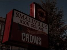 the sign for smallville high school is lit up