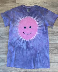 Tie Dye Adult Small 2-Sided Smiley Face T- shirt, gender neutral,  100% cotton, Very soft and comfortable. Only the highest quality,  professional dyes used. Washed out with earth-friendly detergent.  Will never run or fade! *This is the exact item you will receive! Pink Cotton T-shirt With Smiley Face, Tie Dye Washed Cotton T-shirt, Washed Tie Dye Cotton T-shirt, Washed Tie-dye Cotton T-shirt, Acid Wash Pre-washed Short Sleeve T-shirt, Hand Dyed Cotton T-shirt, Hand Dyed Pink Cotton T-shirt, Tie Dye Short Sleeve Top, Casual Tie Dye Short Sleeve Top