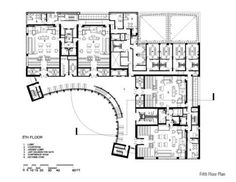 the floor plan for an office building with two floors and three levels, including a spiral staircase