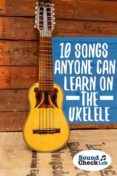 an ukulele with the words 10 songs anyone can learn on the ukelee