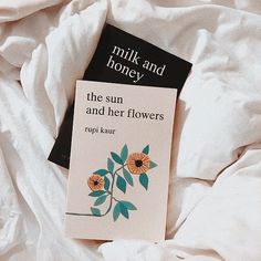 the sun and her flowers by rupa kaur is laying on a white sheet