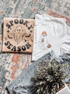 Spooky season tees!🦇 Gildan Unisex tee. Spooky season tee- old gold gildan tee Ghost w/ coffee- gildan white tee (pocket design) 2 styles to choose from. Fall Graphic Tee For Fan Merchandise, White Fall Fan Merchandise T-shirt, White Fan Merchandise T-shirt For Fall, Spooky Short Sleeve T-shirt For Fall, Fan Merchandise T-shirt For Fall, Fun Fall Fan Merchandise T-shirt, Fun Fan Merchandise T-shirt For Fall, Fall Fan Merchandise Fun T-shirt, Spooky Crew Neck T-shirt For Fan Merchandise