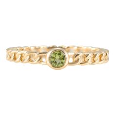 This is part of Chairish’s Fine Jewelry assortment.  Minimalist Round Peridot Stackable Solid Curb Chain Ring in 14K Gold featuring natural peridot of 0.15 carats. The gorgeous handcrafted ring goes with every style, every occasion or any outfit.  Peridot brings delight and good cheer. It attracts love and calms anger by giving renewal to all things. Designed with round cut peridot set in center of the solid chain style shank made in solid gold that makes it a perfect fit to wear it on your occa Gold Stackable Rings With Peridot Birthstone, Stackable Peridot Gemstone Rings For May Birthstone, Peridot Gemstone Stackable Rings For May Birthstone, Elegant Peridot Stackable Rings For May Birthstone, Elegant Peridot Gemstone Stackable Rings, Stackable Yellow Gold Peridot Jewelry, Yellow Gold Stackable Rings With Peridot, Yellow Gold Peridot Rings With Gemstone Accents, Stackable Peridot Gemstone Rings