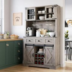 a kitchen area with a wooden cabinet and green cabinets