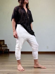 White cotton glorka jogger style pants are finally here! The slight dropcrotch design, not so low as the original glorkas, yet loose enough to enjoy lounging around as well as working out and working at home. Perfect work-leisure attire, great yoga pants option, and a wonderful casual look (maybe a bit on a chic side;) STYLING TIP: Pull them up to the knees, adjust the length you want, add the boots - and rock them at any festival! Try them with sandals or bare foot - and, hey, it’s your go-to yoga/sound bath/meditation outfit! -Unisex-Stretch-Flowing relaxed fit-Inner drawstring to secure the waist-2 side pocketsMaterials: black cotton blend (95% cotton 5% lycra).Fabric for this pair were bought in Fashion District, LA and the pant was made in one of our studios in Brooklyn, NY. Measureme Relaxed Fit Cotton Joggers For Yoga, Tapered Leg Cotton Sweatpants For Yoga, Cotton Tapered Leg Sweatpants For Yoga, Relaxed Fit Drop Crotch Loungewear Pants, Baggy Cotton Sweatpants For Yoga, Relaxed Fit Cotton Sweatpants With Drop Crotch, Sound Bath Meditation, Bath Meditation, Meditation Outfit