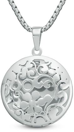 Zales Floral Cutout Circle Locket in Stainless Steel - 24" Silver Round Filigree Locket Necklace, Elegant Round Metal Locket Necklace, Round Locket Necklace With Intricate Design, Silver Round Locket Necklace With Intricate Design, Nickel-free Silver Stainless Steel Locket Necklace, Round Engraved Metal Locket Necklace, Engraved Round Metal Locket Necklace, Stainless Steel Round Pendant Locket Necklace, Circle Locket