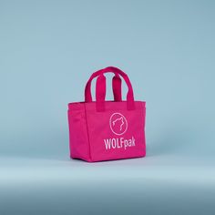 A High Quality, Lightweight Yet Durable Mini Tote Bag by WOLFpak. This Tote Bag Is Extremely Practical For The Office, Gym, Beach and More! 10L Tote Bag 10.5in (27cm) W x 9in (23cm) H x 5.5in (14cm) D Waterproof Surface Oxford 1000D Polyester Dual Exterior Side Pockets Hand Carrying Straps or Over the Shoulder Branded Embroidery Logo Molle Webbing Easy Clean Polyurethane Lining Protective Inside Computer Sleeve 10in x 6in (Fits Small Tablet) Inside Zipper Pocket (2) Mesh Card Pockets Pink Rectangular Bag With Reinforced Handles, Pink Everyday Bag With Reinforced Handles, Functional Pink Shopping Bags, Large Pink Everyday Bag, Pink Shopping Bags With Reinforced Handles, Pink Travel Bag With Reinforced Handles, Large Capacity Pink Tote Lunch Bag, Pink Large Capacity Tote Lunch Bag, Pink Medium Bag For Daily Use