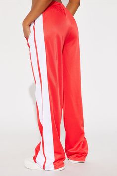 Available In Black Track Pant Low Rise Elastic Waistband Side Stripe Wide Leg Self: 100% Polyester Contrast: 100% Polyester Imported | Tinashe Track Pant in Red size 2X by Fashion Nova Red Wide Leg Sweatpants With Elastic Waistband, Red Sporty Full-length Bottoms, Red Compressive Athleisure Pants, Red Track Pants, Red Full-length Pants With Elastic Waistband, Tracksuit Pants, Side Stripe, Red Fashion, Track Pants