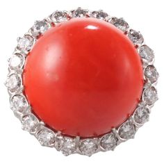 1960s vintage 18k gold cocktail ring, featuring center 17.6mm coral, surrounded with approx. 1.60ctw SI1/H diamonds. Ring size 7.75, top is 22mm in diameter. Tested 18k, not marked. Weight of the piece - 14.5 grams. 14k White Gold Diamond Ring, Gold Cocktail Ring, Coral Ring, Gold Cocktail, Coral Jewelry, Round Diamond Engagement Rings, White Gold Diamond Rings, Diamond Gold, Diamond Cluster Ring