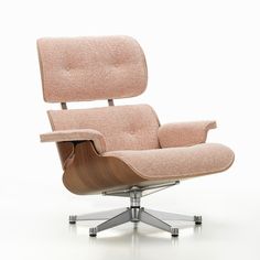 the eames lounge chair is upholstered with wood