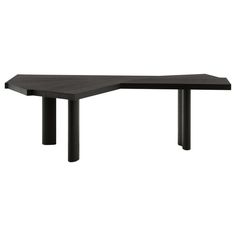 an angled table with black legs on a white background